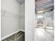 Closet leading to a modern bathroom with a large shower at 4260 Columbus Dr, Hernando Beach, FL 34607
