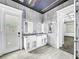Bright bathroom boasts double sinks and modern design at 4260 Columbus Dr, Hernando Beach, FL 34607