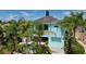 Luxury waterfront home with pool and lush landscaping at 4260 Columbus Dr, Hernando Beach, FL 34607