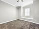 Cozy bedroom with window shutters and neutral tones at 4260 Columbus Dr, Hernando Beach, FL 34607