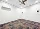 Large bedroom with carpeted floors and ceiling fan at 4260 Columbus Dr, Hernando Beach, FL 34607