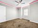 Bedroom with window seat and neutral color palette at 4260 Columbus Dr, Hernando Beach, FL 34607