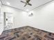 Spacious office with new carpet and ceiling fan at 4260 Columbus Dr, Hernando Beach, FL 34607