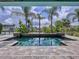 Inviting rectangular pool with stone coping and surrounding patio at 4260 Columbus Dr, Hernando Beach, FL 34607