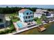 Two-story waterfront home with private pool, dock and spacious deck at 3423 Palometa Dr, Hernando Beach, FL 34607