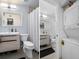 This bathroom features a modern vanity, toilet and tiled floor at 2207 Belleair Rd # A32, Clearwater, FL 33764