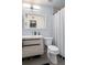 This bathroom features a modern vanity, toilet and tiled floor at 2207 Belleair Rd # A32, Clearwater, FL 33764