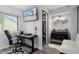 Bright office space featuring modern desk, laminate flooring and in-unit laundry access at 2207 Belleair Rd # A32, Clearwater, FL 33764