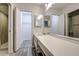 Bright bathroom features a spacious vanity and neutral tones at 2727 Featherstone Dr # 2727, Holiday, FL 34691