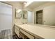 Bright bathroom features a spacious vanity and neutral tones at 2727 Featherstone Dr # 2727, Holiday, FL 34691