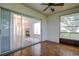 Sun room with floor to ceiling windows at 2727 Featherstone Dr # 2727, Holiday, FL 34691