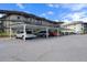 View of the assigned covered parking area for residents and guests at 4632 Marine Pkwy # 302, New Port Richey, FL 34652