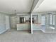 Kitchen features stainless steel appliances and a breakfast bar at 4713 Tiburon Dr, New Port Richey, FL 34655