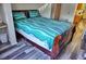 Cozy bedroom with a view into the kitchen area at 1955 Abrico Dr # G7, Lutz, FL 33558
