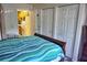 Bedroom with a view of the kitchen and lots of closet space at 1955 Abrico Dr # G7, Lutz, FL 33558