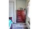 Bedroom with a dresser and closet at 1955 Abrico Dr # G7, Lutz, FL 33558