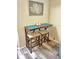 Small breakfast bar with two stools, perfect for a quick meal at 1955 Abrico Dr # G7, Lutz, FL 33558
