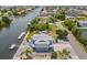 Aerial view of a waterfront home with a private dock and RV parking at 3560 Gulf Coast Dr, Hernando Beach, FL 34607