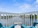 View from deck showcasing the canal and neighboring properties at 3560 Gulf Coast Dr, Hernando Beach, FL 34607