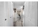 Bright hallway with updated flooring and ample closet space at 2207 Belleair Rd # A32, Clearwater, FL 33764