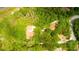 House nestled in a wooded area with a long driveway at 11193 Baltimore St, Weeki Wachee, FL 34614