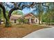 One-story home exterior with driveway and landscaping at 11193 Baltimore St, Weeki Wachee, FL 34614