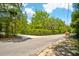 Street view showing the home's location and landscaping at 11193 Baltimore St, Weeki Wachee, FL 34614