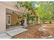 Covered patio with grill and outdoor seating area at 11193 Baltimore St, Weeki Wachee, FL 34614