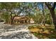 Attractive craftsman style house with a large circular driveway at 11193 Baltimore St, Weeki Wachee, FL 34614