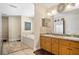 Bathroom boasts double sinks, a soaking tub, and tasteful tile at 11193 Baltimore St, Weeki Wachee, FL 34614