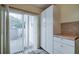 Eat-in kitchen nook with sliding glass doors leading to the patio at 2727 Featherstone Dr # 2727, Holiday, FL 34691
