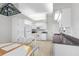 White kitchen with granite countertops and a small breakfast nook at 4213 Avanti Cir, New Port Richey, FL 34655