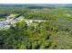 Aerial view of a wooded lot near waterways at 7413 Gettysburg Dr, Weeki Wachee, FL 34607