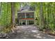 Two-story waterfront home with a large deck at 7413 Gettysburg Dr, Weeki Wachee, FL 34607