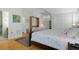 Bright bedroom with a queen bed and built-in murphy bed at 7413 Gettysburg Dr, Weeki Wachee, FL 34607