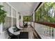 Relaxing screened porch with rocking chairs and wooded views at 7413 Gettysburg Dr, Weeki Wachee, FL 34607