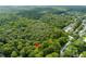 Aerial view of a wooded lot near a town at 7413 Gettysburg Dr, Weeki Wachee, FL 34607