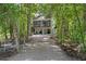 Two-story house nestled in a wooded setting at 7413 Gettysburg Dr, Weeki Wachee, FL 34607