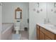 Bathroom with a bathtub, toilet and double vanity at 7413 Gettysburg Dr, Weeki Wachee, FL 34607