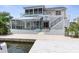 Two-story home with a screened pool and private dock at 6412 Yvette Dr, Hudson, FL 34667