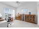 Home office with built-in wooden cabinets at 6412 Yvette Dr, Hudson, FL 34667