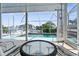 Enjoy the canal view from this screened pool area at 6412 Yvette Dr, Hudson, FL 34667