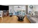 Comfortable living room with access to the screened porch at 6412 Yvette Dr, Hudson, FL 34667