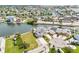 Aerial view of waterfront property with boat dock at 6412 Yvette Dr, Hudson, FL 34667