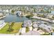 Aerial view of waterfront property with boat dock at 6412 Yvette Dr, Hudson, FL 34667