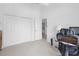 Home office space with built in shelving and comfortable chair at 6412 Yvette Dr, Hudson, FL 34667