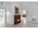 Hallway featuring a charming electric fireplace at 6412 Yvette Dr, Hudson, FL 34667