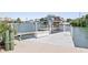 Private boat dock with lift and spacious deck at 6412 Yvette Dr, Hudson, FL 34667