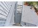 Exterior stairs leading down to the backyard at 6412 Yvette Dr, Hudson, FL 34667