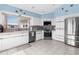 Modern kitchen with stainless steel appliances at 6412 Yvette Dr, Hudson, FL 34667